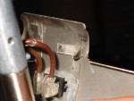 Pinched wire and the flash mark on the back casing when it flashed over to earth.